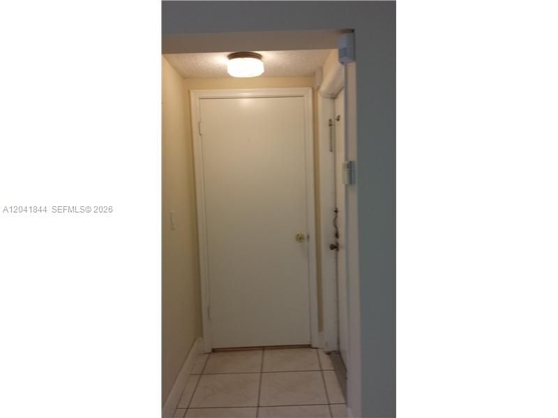 8610 Southwest 149th Avenue, Unit 504 Miami, FL 33193 - Photo 7 of 13 a en suite bathroom with a shower