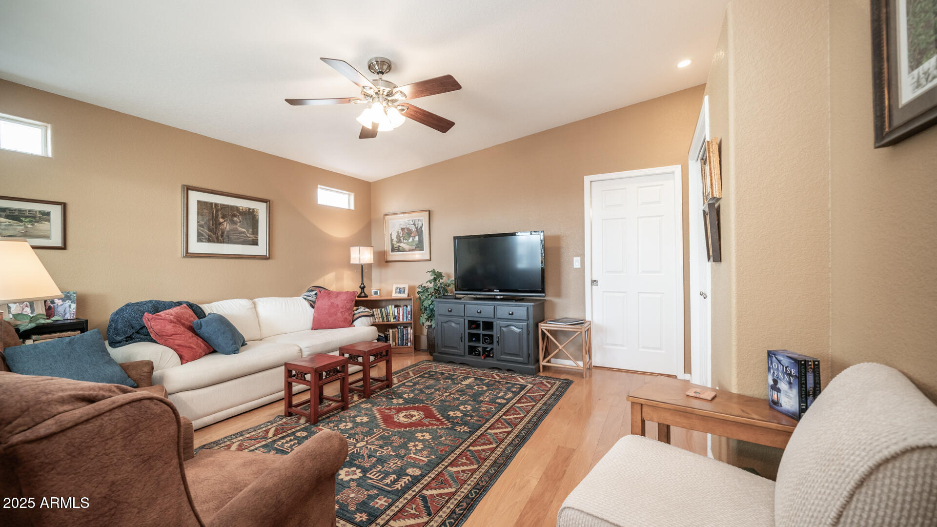 361 Felspar Drive Apache Junction, AZ 85119 - Photo 1 of 71 a living room with furniture and a flat screen tv