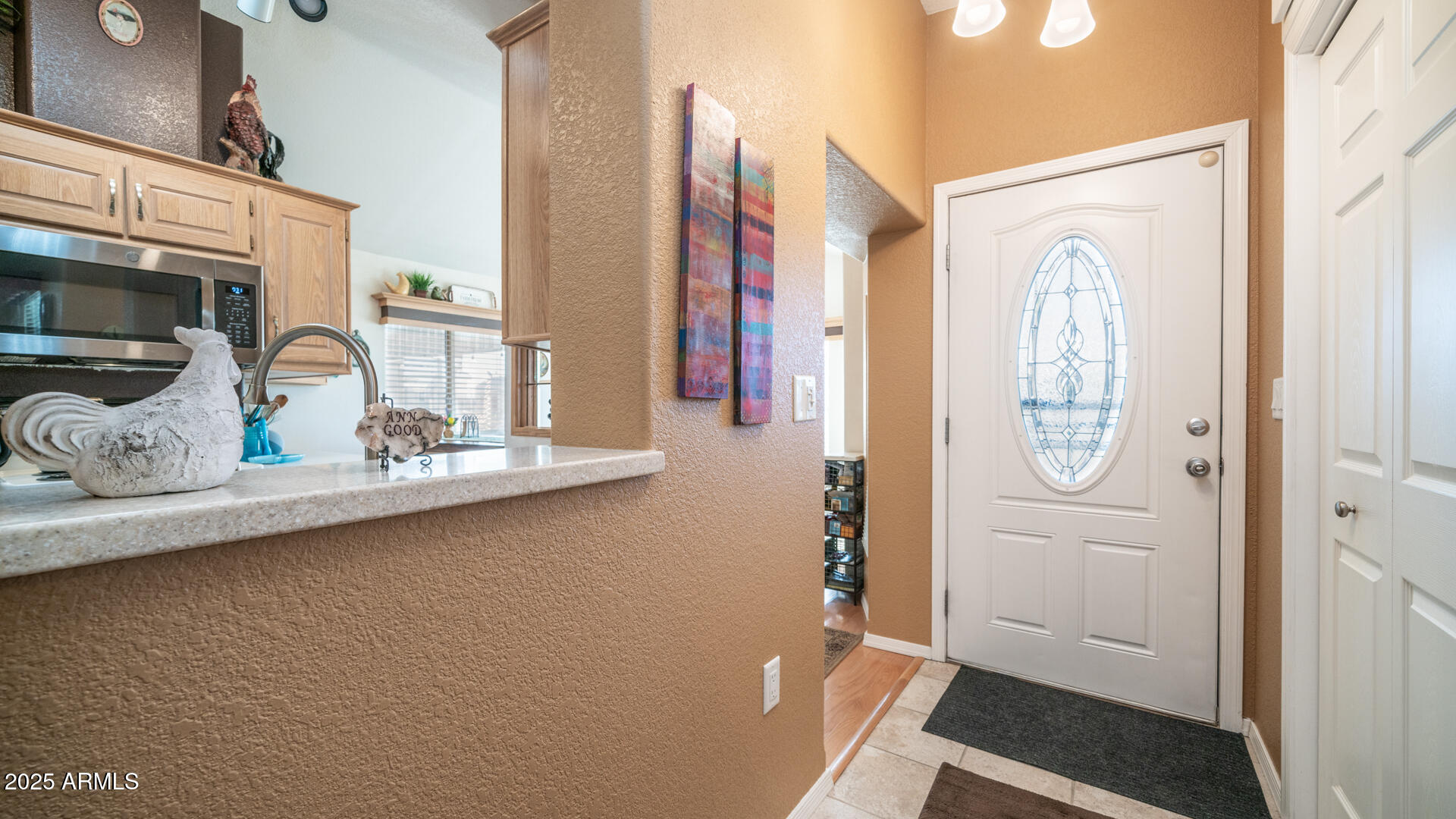 361 Felspar Drive Apache Junction, AZ 85119 - Photo 16 of 71 a bathroom with a sink a mirror and shower