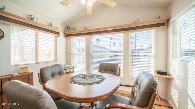 a view of living room with granite countertop furniture and a floor to ceiling window