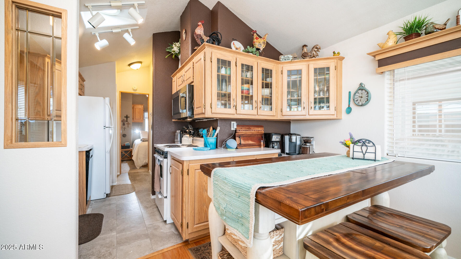 361 Felspar Drive Apache Junction, AZ 85119 - Photo 21 of 71 a dinning room with a table and chairs