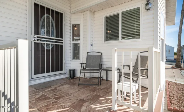 a front view of a house with washer and dryer