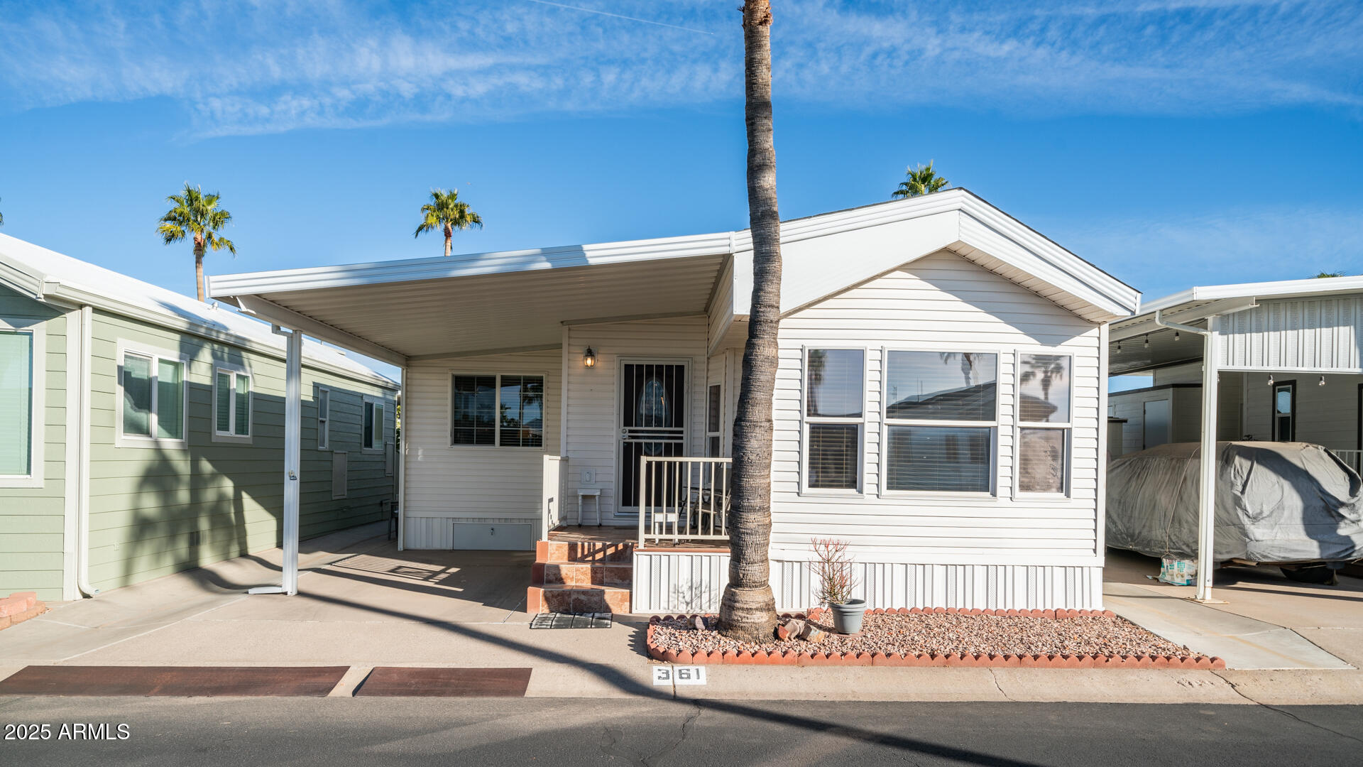 361 Felspar Drive Apache Junction, AZ 85119 - Photo 32 of 71 a front view of a house with a porch
