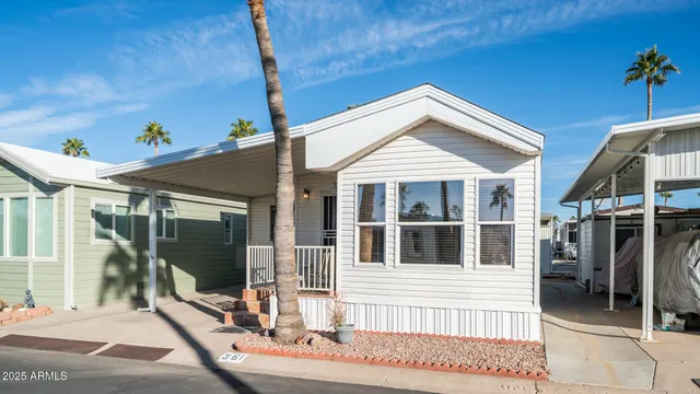 a view of a door and a window of the house