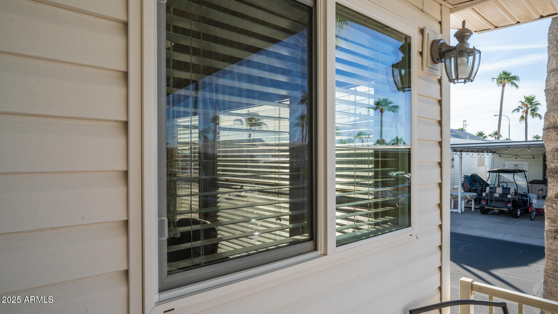 361 Felspar Drive Apache Junction, AZ 85119 - Photo 41 of 71 a view of a door and a window of the house