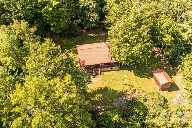 a view of a large building with a mountain in the background