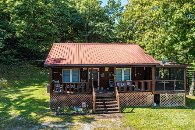 a view of a lot of mountains and a yard