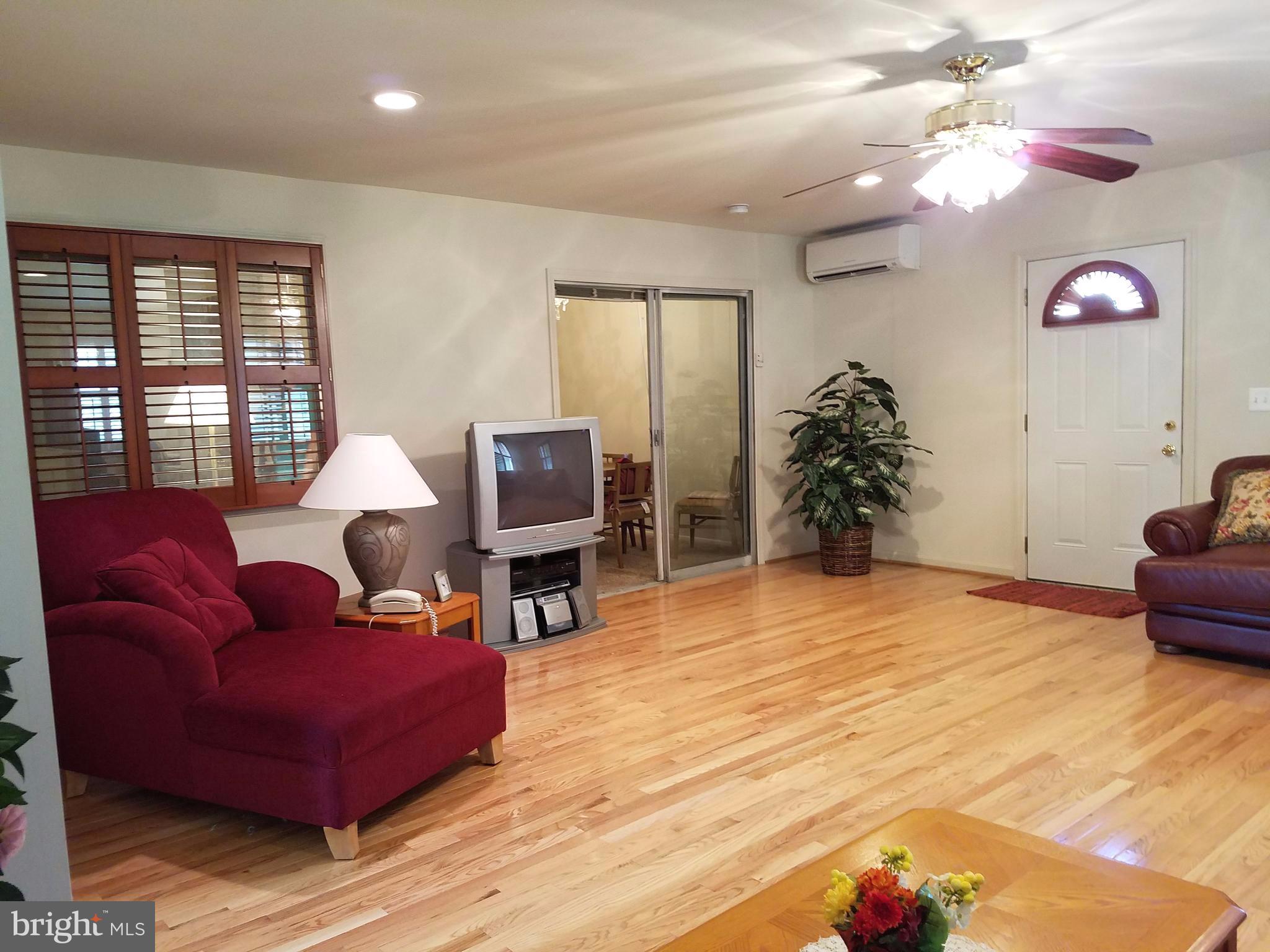 Hard Wood Floors and ceiling fan for comfort