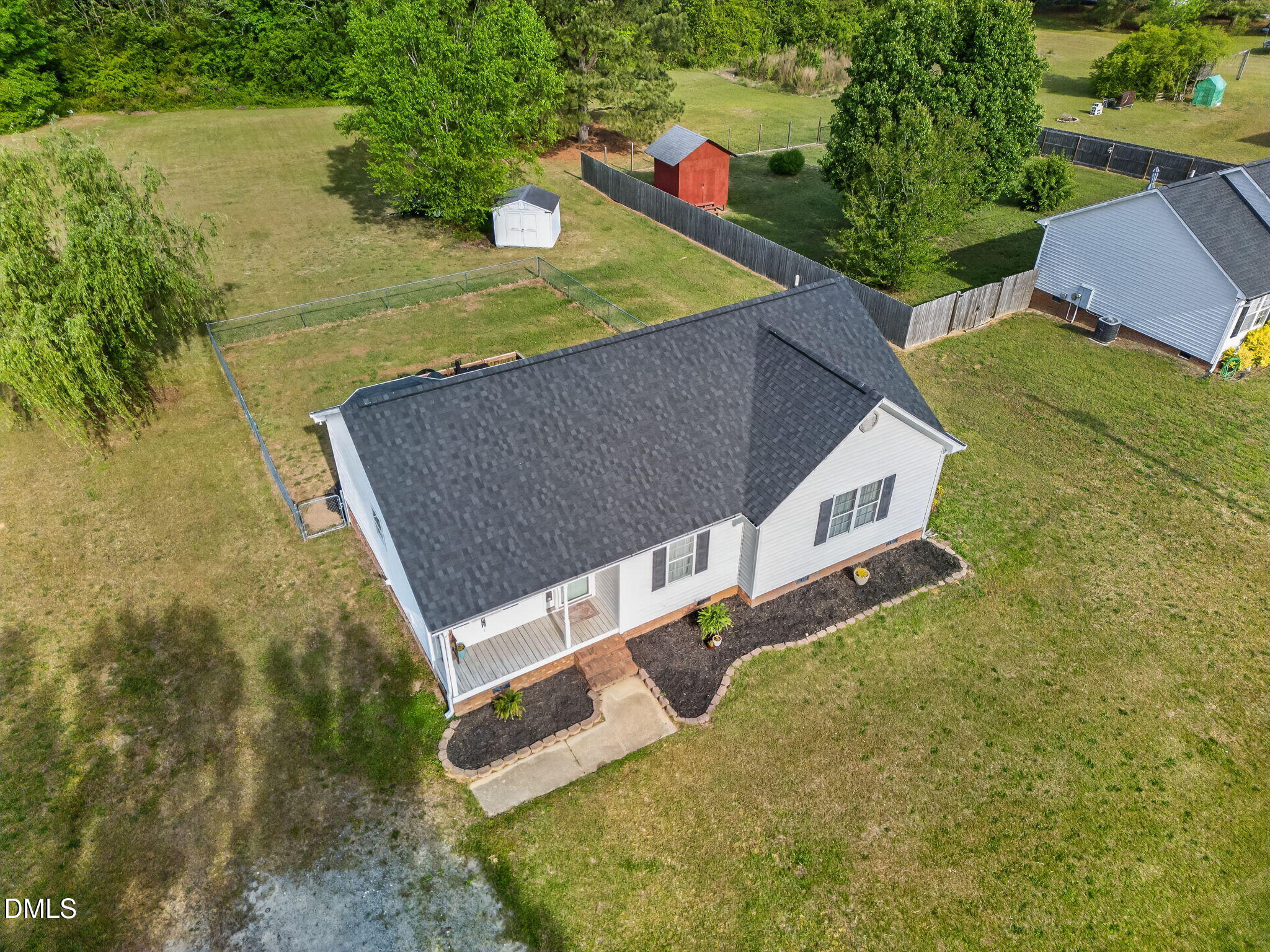 1101 Live Oak Road Coats, NC 27521 - Photo 25 of 29 a aerial view of a house with a yard