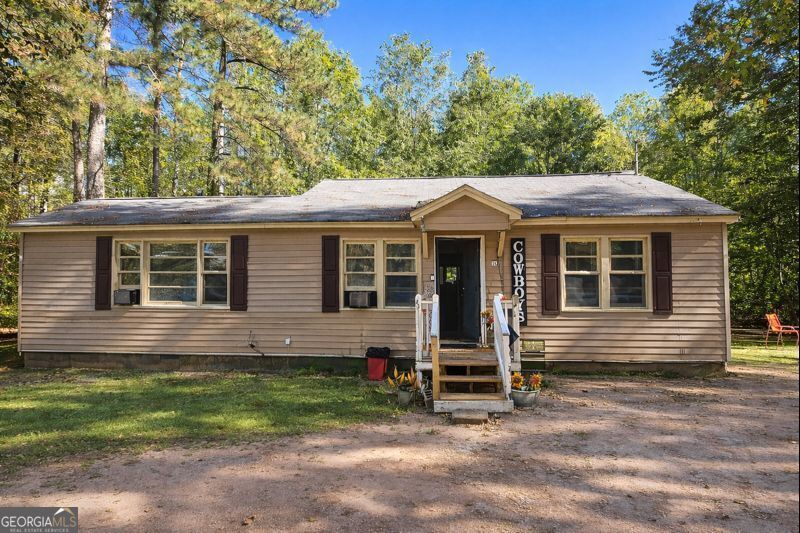377 Dock Hyde Road Carrollton, GA 30116 - Photo 3 of 32 a front view of a house with a yard