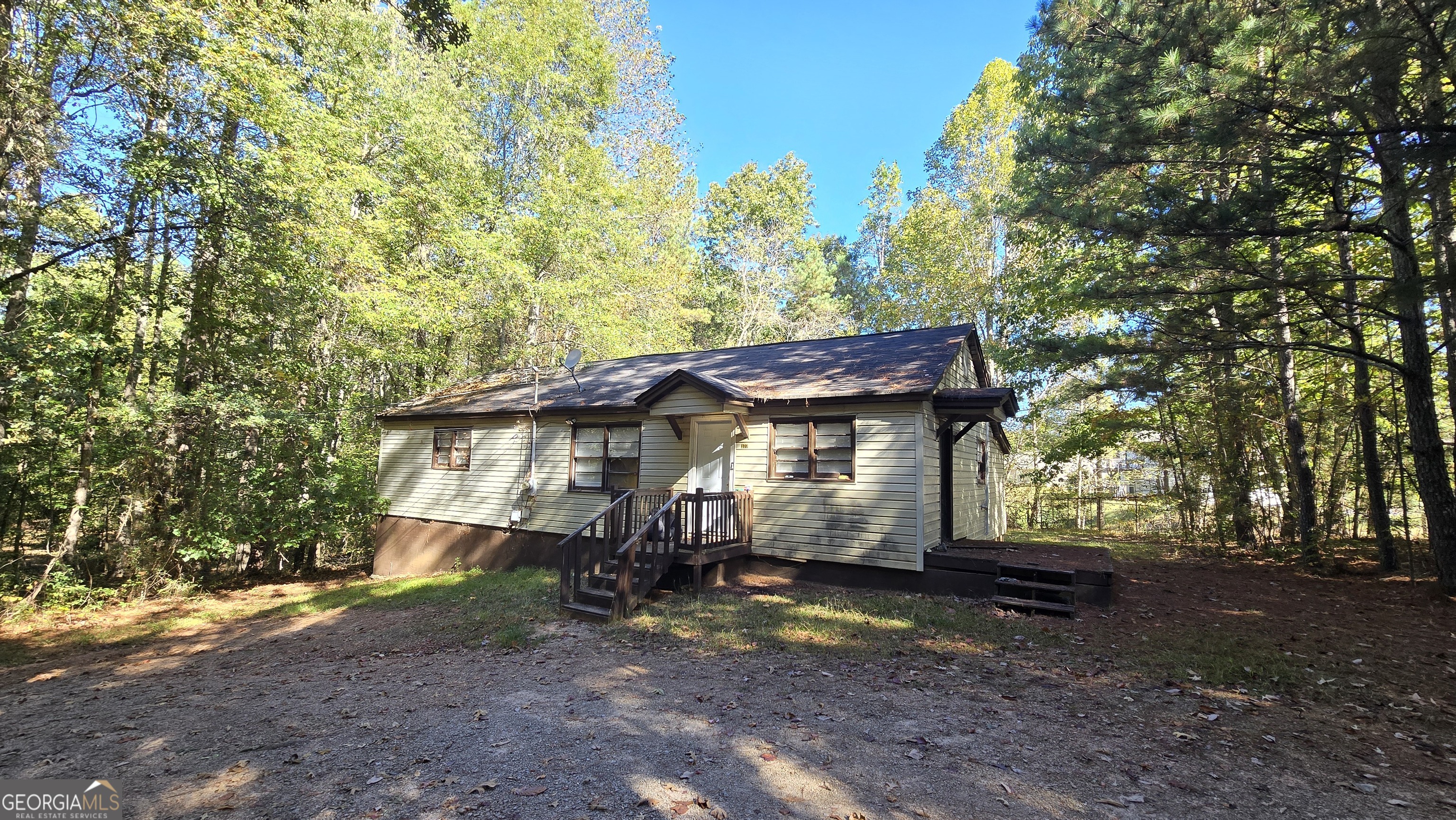 377 Dock Hyde Road Carrollton, GA 30116 - Photo 4 of 32 a view of a house with a yard