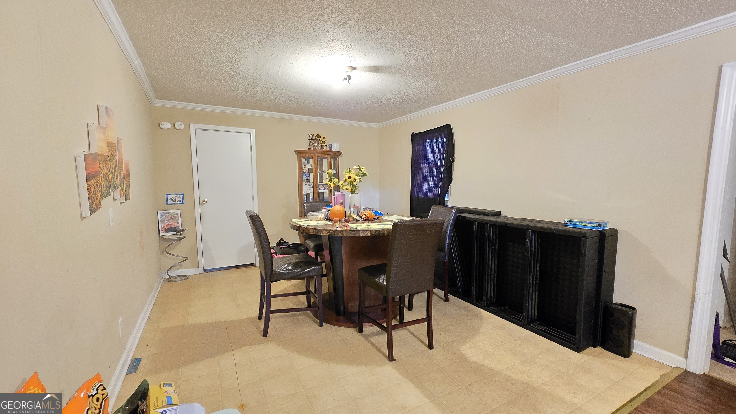 377 Dock Hyde Road Carrollton, GA 30116 - Photo 8 of 32 a view of a dining room with furniture