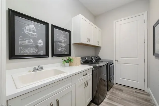 a kitchen with a sink stove and refrigerator