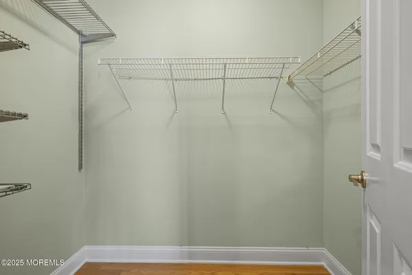 a view of a room with racks on the wall