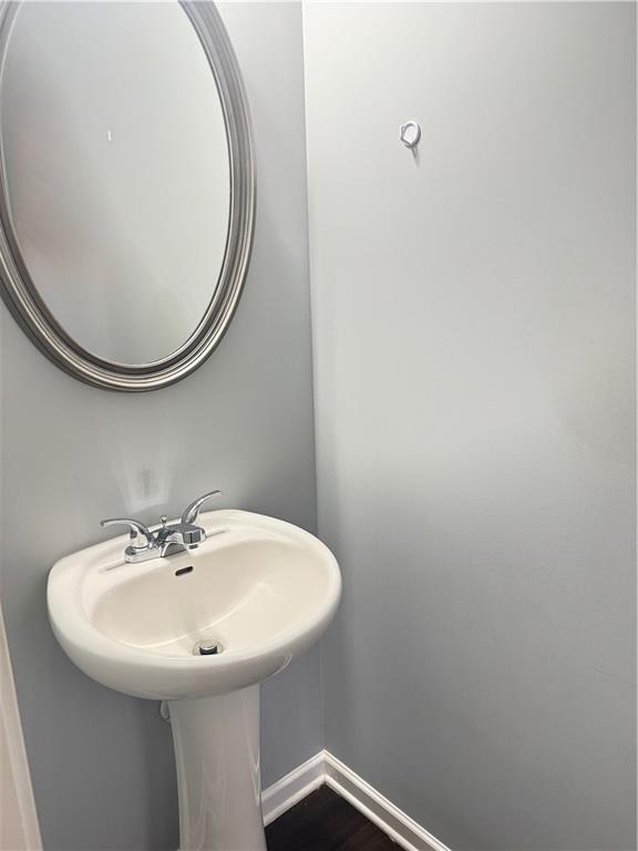 183 Spring Way Square Canton, GA 30114 - Photo 11 of 29 a bathroom with a sink and a mirror