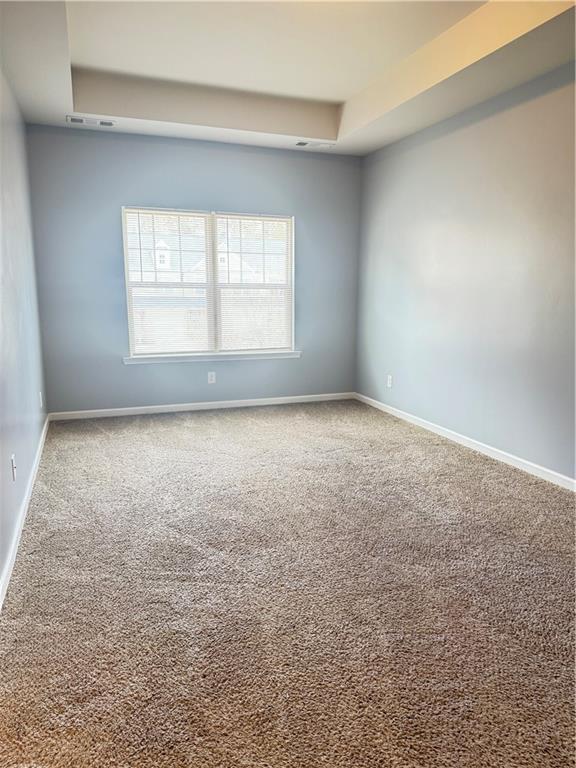 183 Spring Way Square Canton, GA 30114 - Photo 15 of 29 an empty room with a window