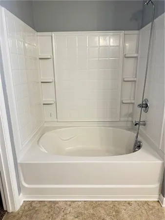 a bathroom with a bathtub