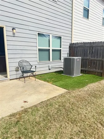 a house with swimming pool in front of it