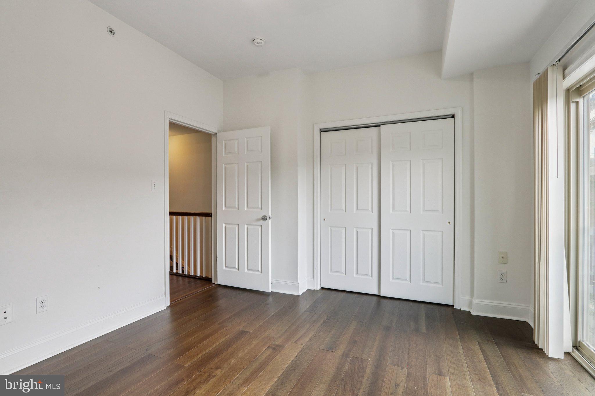605 North 12th Street, Unit B Philadelphia, PA 19123 - Photo 14 of 22 a view of a livingroom with wooden floor