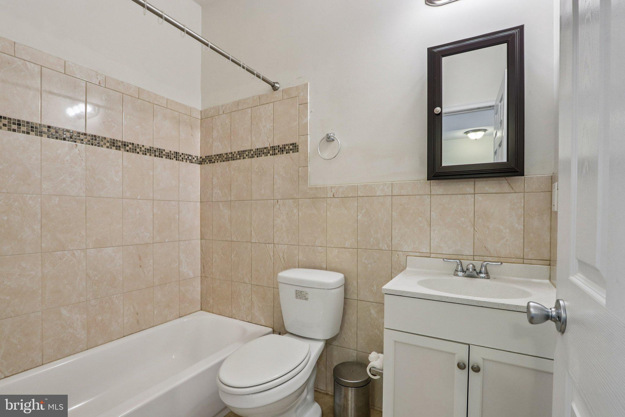 605 North 12th Street, Unit B Philadelphia, PA 19123 - Photo 15 of 22 a bathroom with a toilet sink and shower