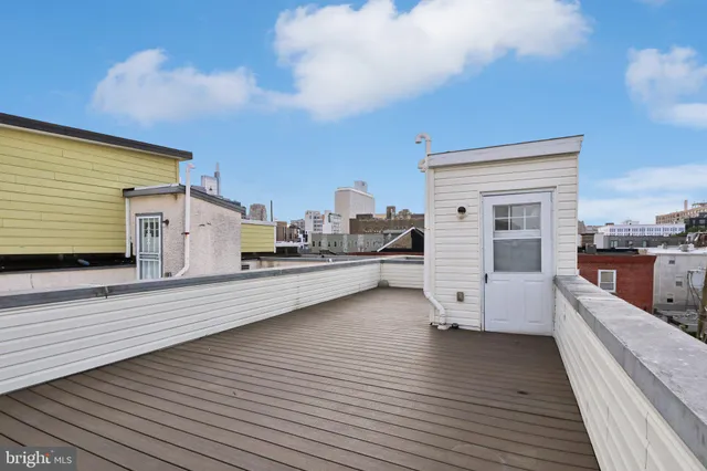 a view of a terrace with chairs