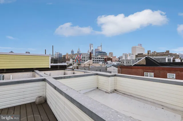 a view of a terrace with sitting area
