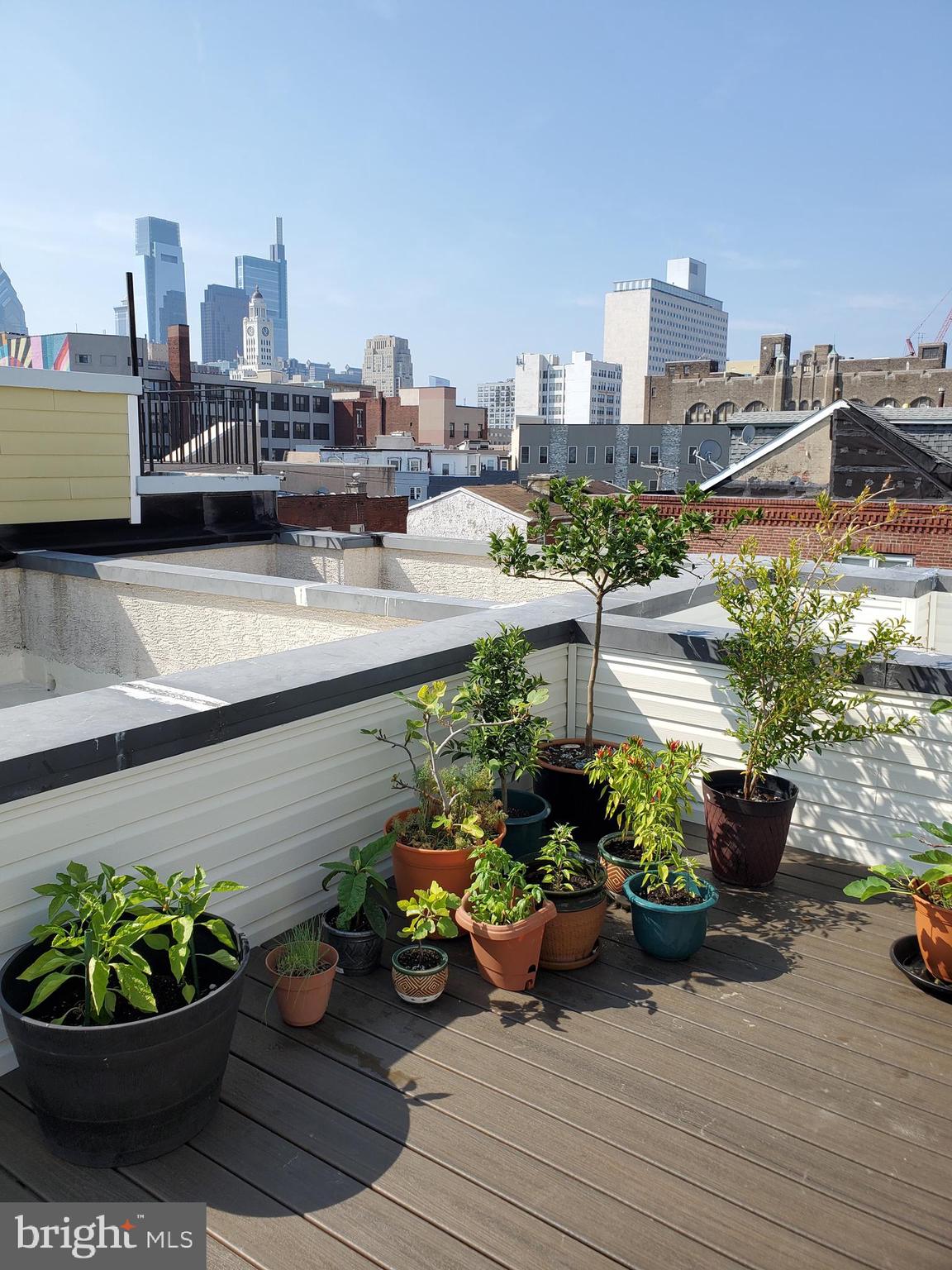 605 North 12th Street, Unit B Philadelphia, PA 19123 - Photo 20 of 22 a view of a terrace with chairs and potted plants
