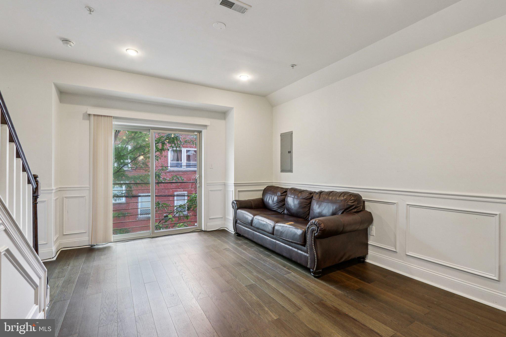 605 North 12th Street, Unit B Philadelphia, PA 19123 - Photo 6 of 22 a living room with furniture and a wooden floor