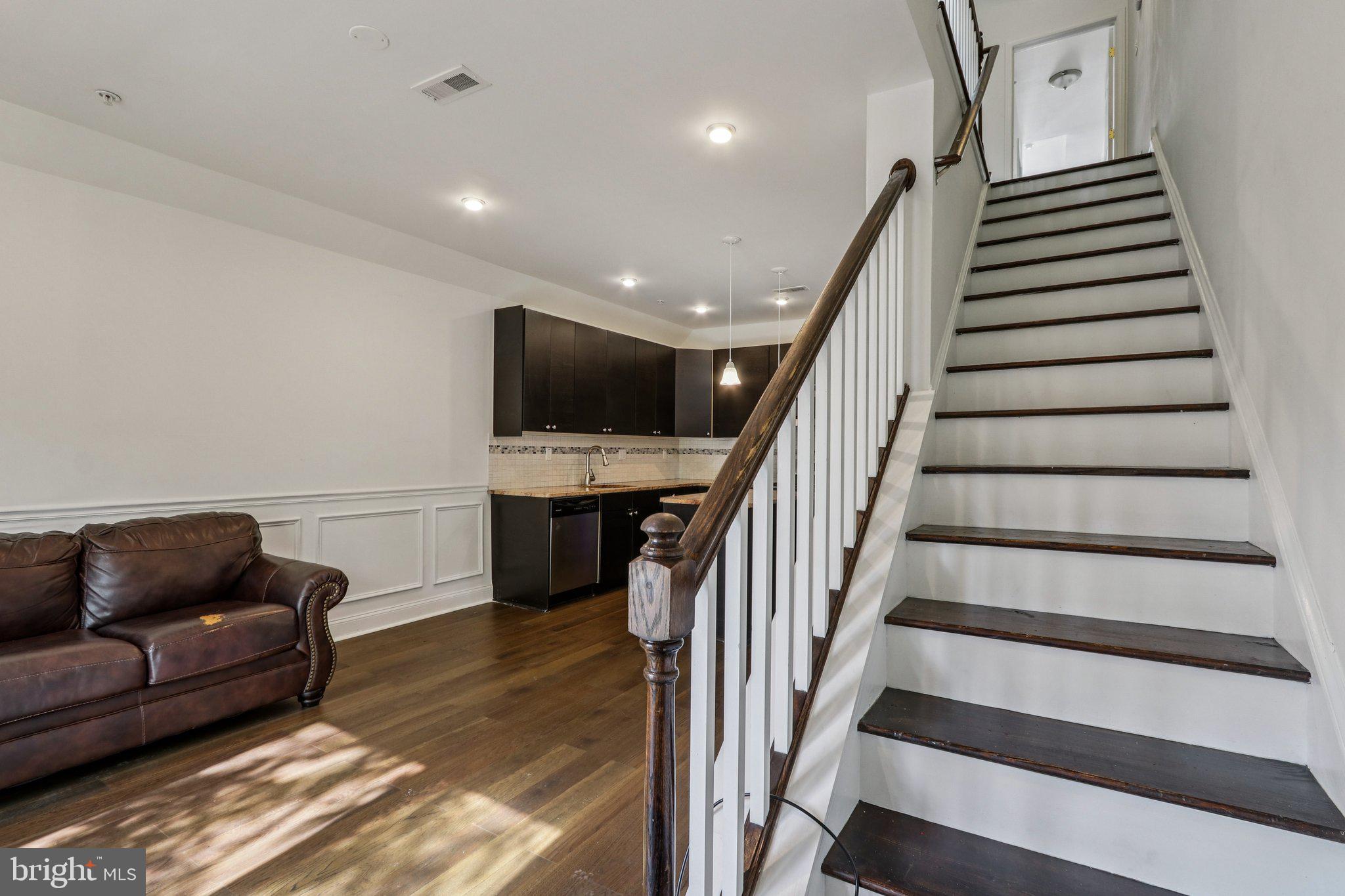 605 North 12th Street, Unit B Philadelphia, PA 19123 - Photo 9 of 22 a living room with furniture and a flat screen tv