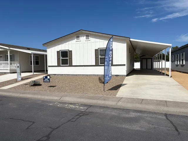 a front view of a house with yard
