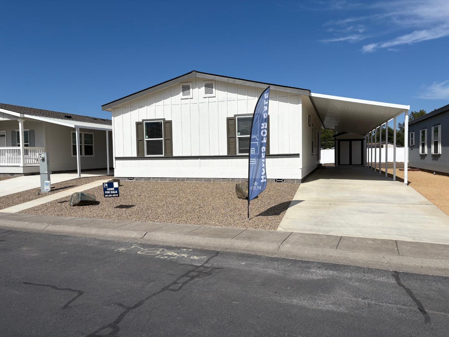 Undisclosed Address Medford, OR 97501 - Photo 2 of 9 a front view of a house with yard