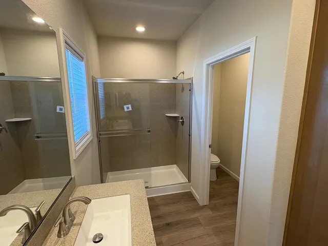 a bathroom with a tub and a sink