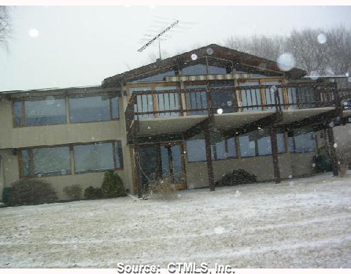 1143 North Road Killingly, CT 06241 - Photo 1 of 1 a front view of a house with a yard