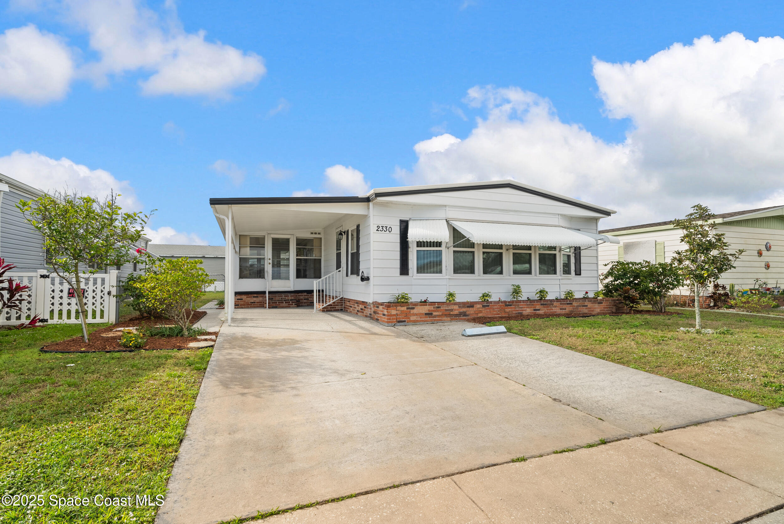 2330 Ersoff Boulevard Northeast Palm Bay, FL 32905 - Photo 3 of 35 Front Left