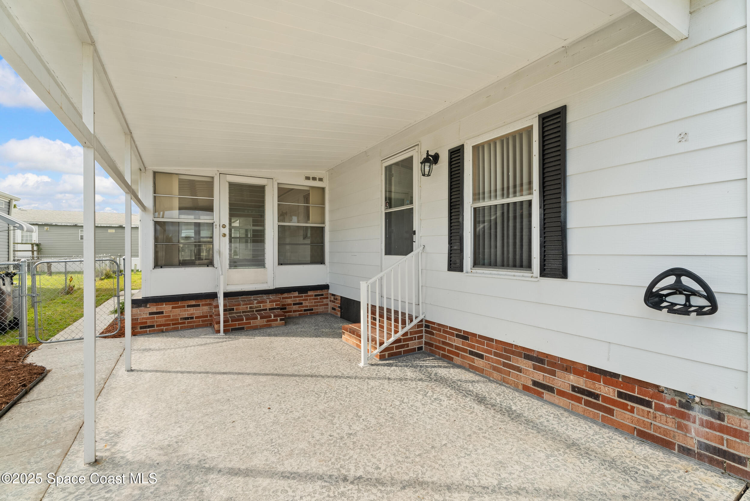 2330 Ersoff Boulevard Northeast Palm Bay, FL 32905 - Photo 4 of 35 Car Port