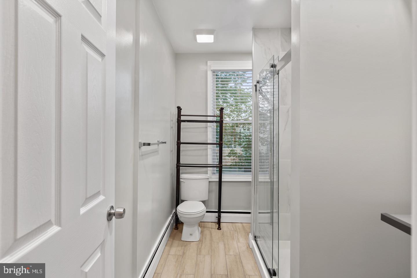 225 14th Place Northeast Washington, DC 20002 - Photo 12 of 20 Bright and airy modern bathroom retreat.