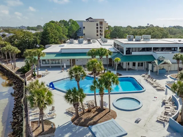 a view of a patio with furniture