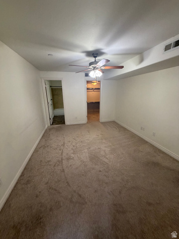 909 South Main Street, Unit F Layton, UT 84041 - Photo 12 of 20 Carpeted room featuring a ceiling fan with integrated lighting, recessed lighting, and white baseboards