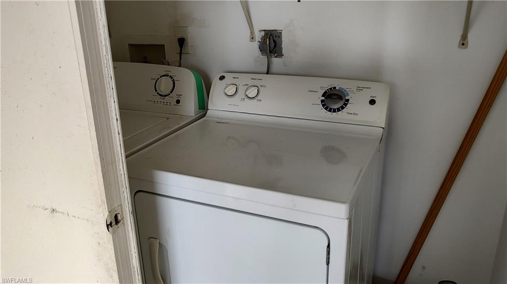 585 106th Avenue North Naples, FL 34108 - Photo 10 of 15 a utility room with dryer and washer