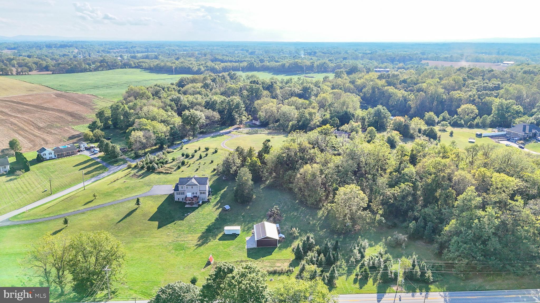 18614 Breathedsville Road Boonsboro, MD 21713 - Photo 4 of 13 an aerial view of a houses with a yard