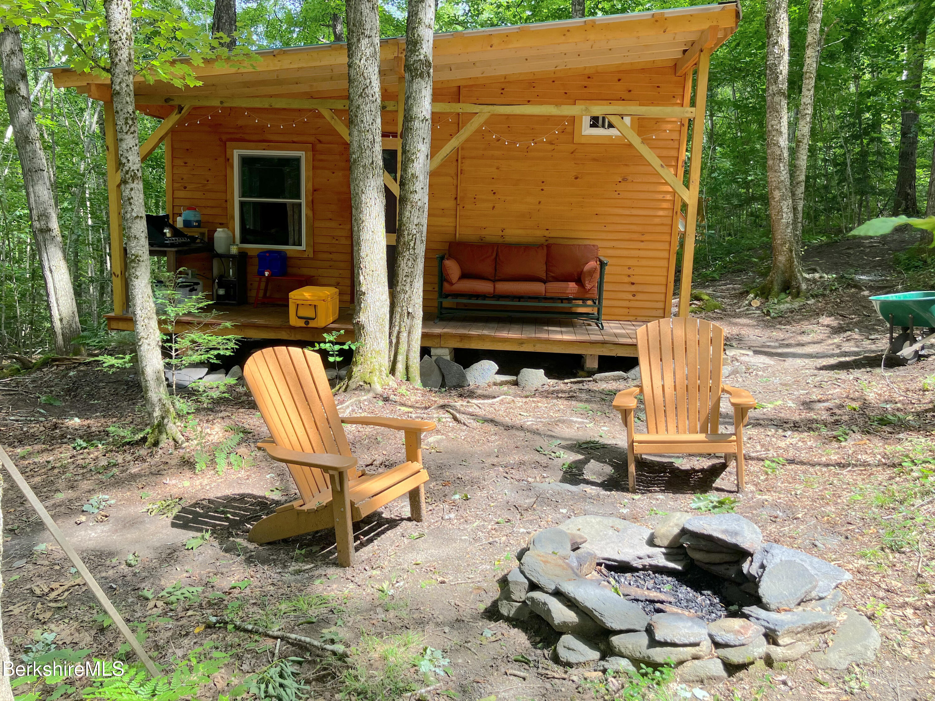 141 Stage Road Cummington, MA 01026 - Photo 21 of 25 a view of backyard with barbeque grill and outdoor seating