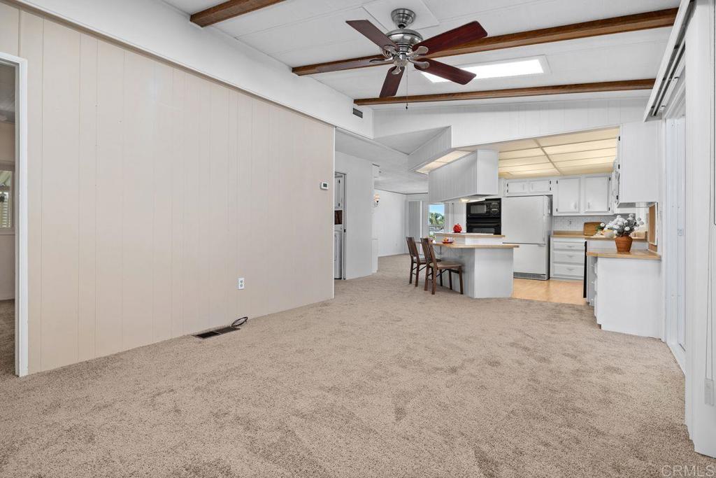 1175 La Moree Road, Unit 85 San Marcos, CA 92078 - Photo 32 of 68 Family Room & Kitchen
