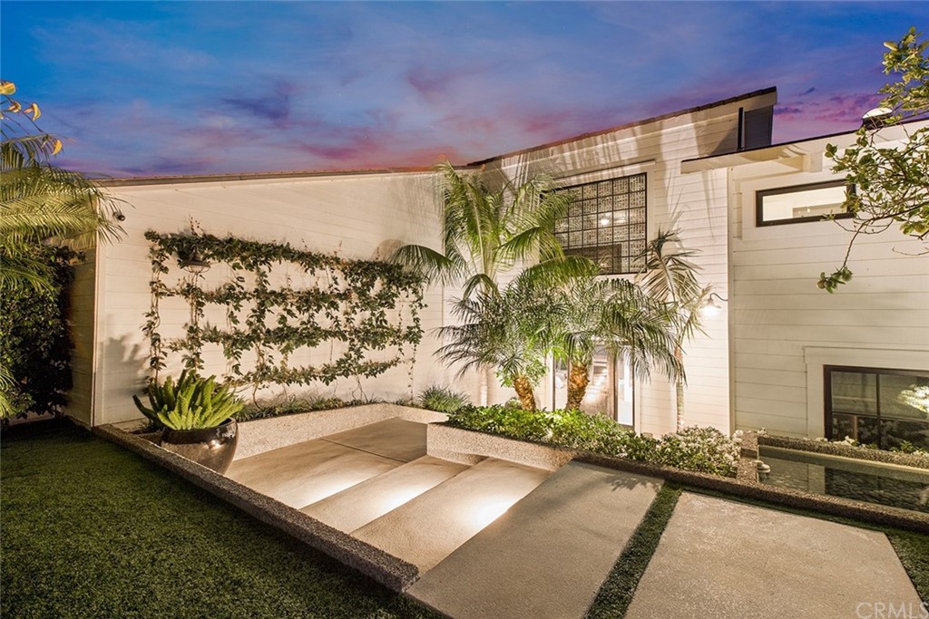 345 Heather Place Laguna Beach, CA 92651 - Photo 11 of 41 a view of a balcony with chairs and a table