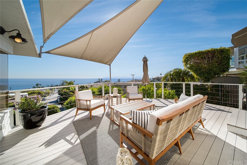 345 Heather Place Laguna Beach, CA 92651 - Photo 17 of 41 a view of a roof deck with couches