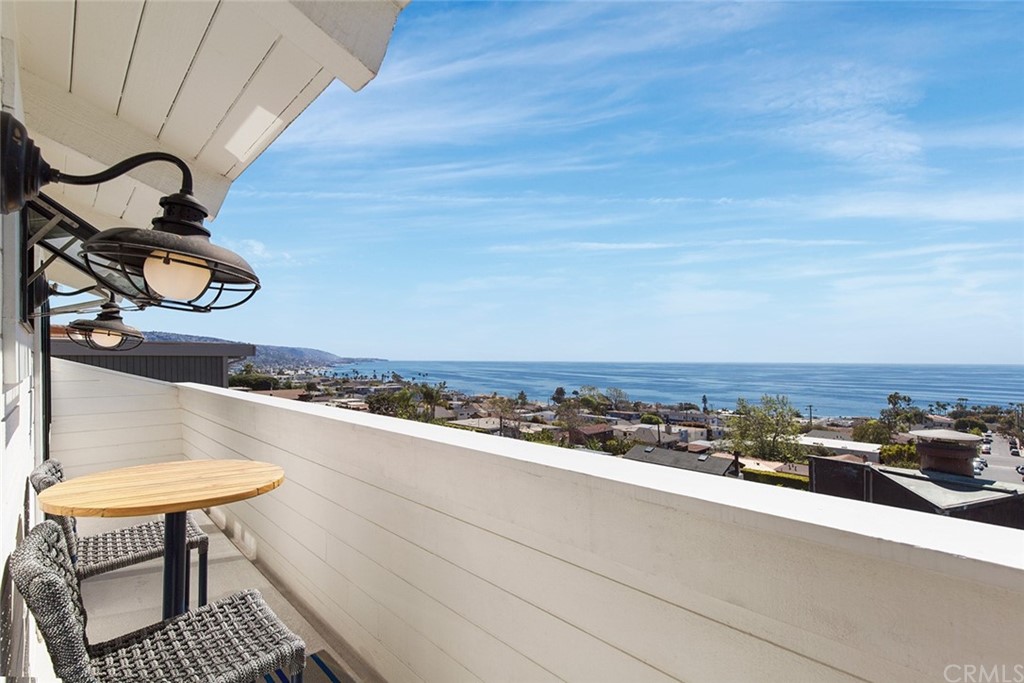 345 Heather Place Laguna Beach, CA 92651 - Photo 31 of 41 a view of a chairs and table in patio