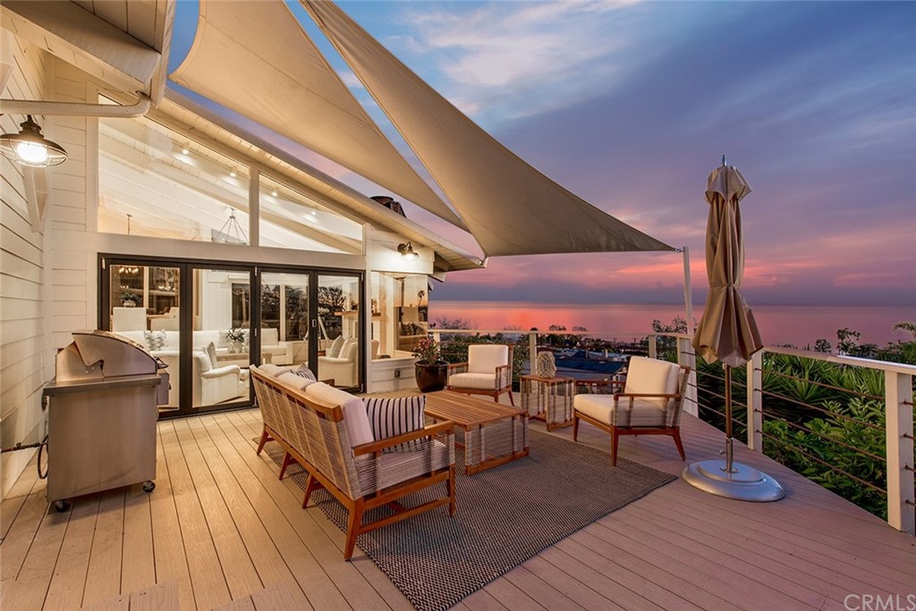 345 Heather Place Laguna Beach, CA 92651 - Photo 6 of 41 a outdoor space with patio lots of furniture and wooden floor