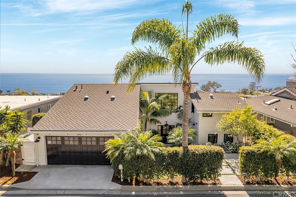 345 Heather Place Laguna Beach, CA 92651 - Photo 9 of 41 an aerial view of multiple house with palm tree