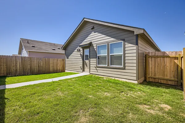 a front view of a house having yard