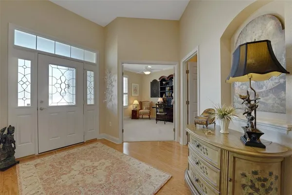a view of livingroom with furniture and mirror