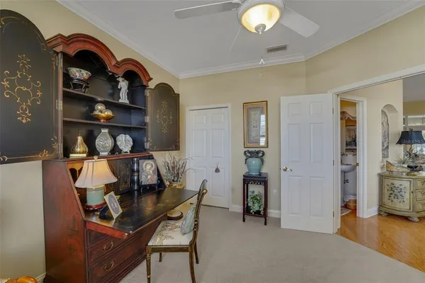 a view of a livingroom with furniture and closet
